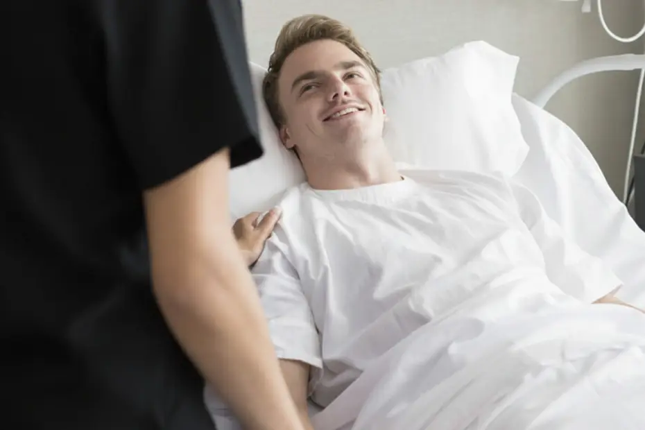 Patient dans un lit d'h&ocirc;pital.